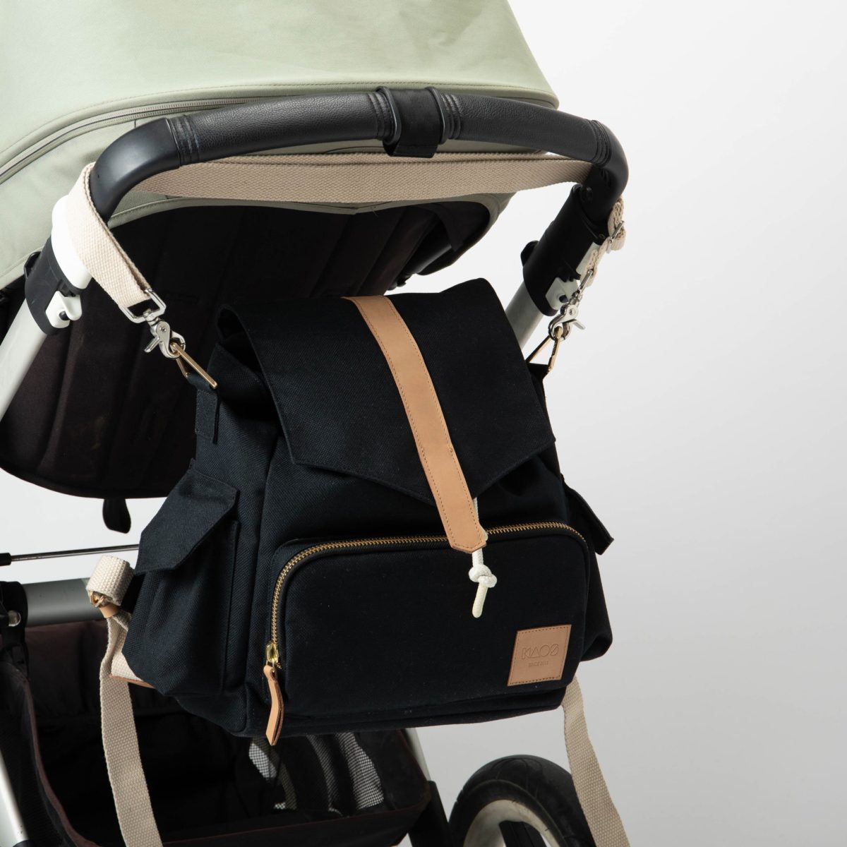 Diaper bag fits all strollers